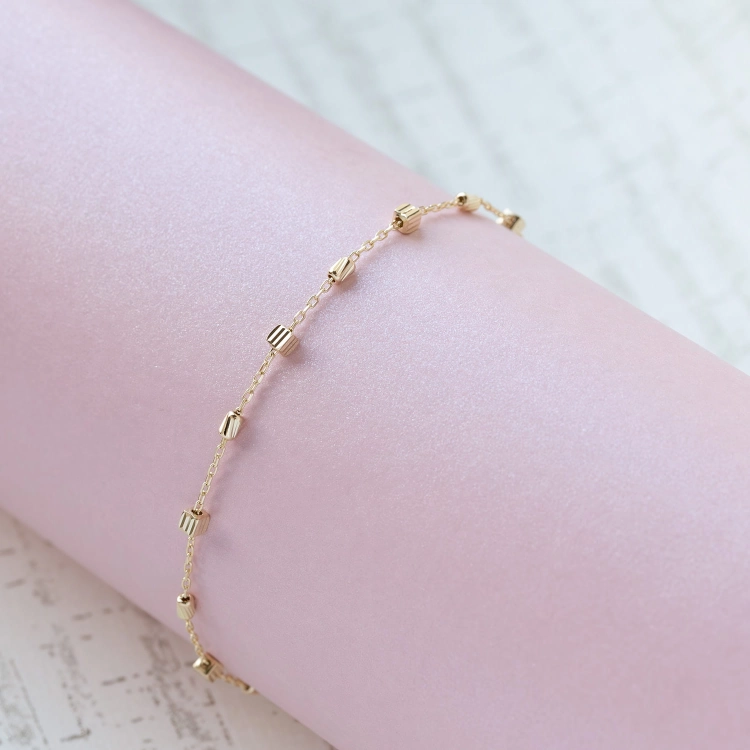 Widok zapięcia i profilu: Złota bransoletka z diamentowanymi kostkami złoto 585 18.50+2.50 cm 0.25 cm Amazyt